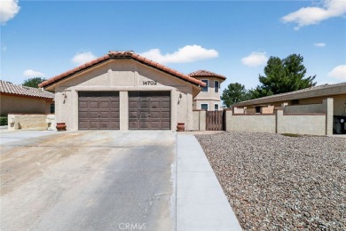 Welcome to 14702 Robin Ln, a spacious 4-bedroom, 2-bath home on Silver Lakes Golf Course in California - for sale on GolfHomes.com, golf home, golf lot