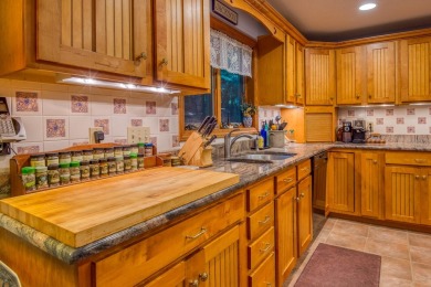 Presenting a beautiful, updated ski house or year-round home on Wentworth Golf Club in New Hampshire - for sale on GolfHomes.com, golf home, golf lot