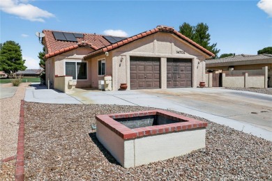 Welcome to 14702 Robin Ln, a spacious 4-bedroom, 2-bath home on Silver Lakes Golf Course in California - for sale on GolfHomes.com, golf home, golf lot