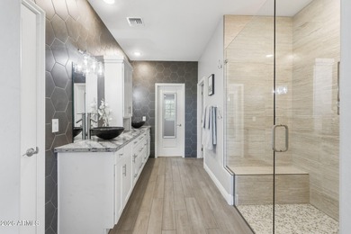 Situated on Hole 14, this beautifully upgraded home showcases on Verrado Golf Club - Victory in Arizona - for sale on GolfHomes.com, golf home, golf lot