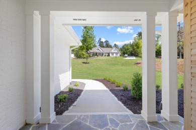 THIS GORGEOUS NEW CONSTRUCTION IS DIRECTLY ON OSPREY POINTE POND on Harbor Club Golf and Country Club in Georgia - for sale on GolfHomes.com, golf home, golf lot