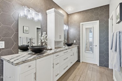 Situated on Hole 14, this beautifully upgraded home showcases on Verrado Golf Club - Victory in Arizona - for sale on GolfHomes.com, golf home, golf lot