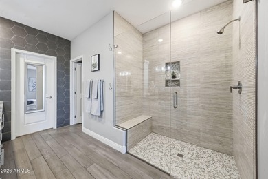 Situated on Hole 14, this beautifully upgraded home showcases on Verrado Golf Club - Victory in Arizona - for sale on GolfHomes.com, golf home, golf lot