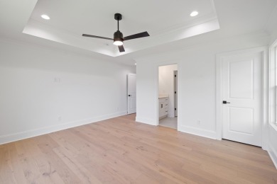 THIS GORGEOUS NEW CONSTRUCTION IS DIRECTLY ON OSPREY POINTE POND on Harbor Club Golf and Country Club in Georgia - for sale on GolfHomes.com, golf home, golf lot