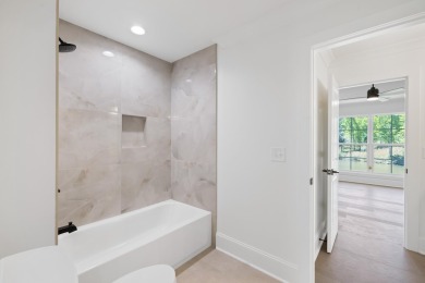 THIS GORGEOUS NEW CONSTRUCTION IS DIRECTLY ON OSPREY POINTE POND on Harbor Club Golf and Country Club in Georgia - for sale on GolfHomes.com, golf home, golf lot