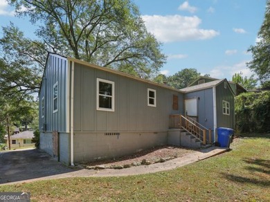 Discover the charm of 1626 Kenmore Street SW, a beautifully on John A. White Golf Course in Georgia - for sale on GolfHomes.com, golf home, golf lot