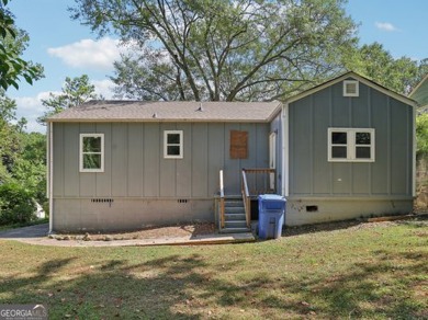 Discover the charm of 1626 Kenmore Street SW, a beautifully on John A. White Golf Course in Georgia - for sale on GolfHomes.com, golf home, golf lot