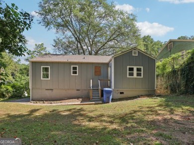 Discover the charm of 1626 Kenmore Street SW, a beautifully on John A. White Golf Course in Georgia - for sale on GolfHomes.com, golf home, golf lot