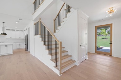 THIS GORGEOUS NEW CONSTRUCTION IS DIRECTLY ON OSPREY POINTE POND on Harbor Club Golf and Country Club in Georgia - for sale on GolfHomes.com, golf home, golf lot