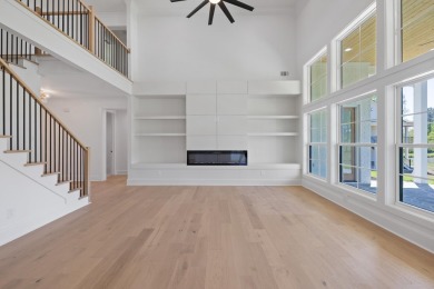 THIS GORGEOUS NEW CONSTRUCTION IS DIRECTLY ON OSPREY POINTE POND on Harbor Club Golf and Country Club in Georgia - for sale on GolfHomes.com, golf home, golf lot