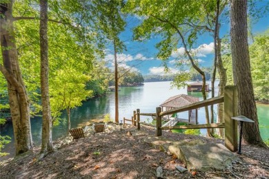 LONG RANGE WATER and BIG MOUNTAIN VIEWS framed by two spring-fed on The Reserve At Lake Keowee in South Carolina - for sale on GolfHomes.com, golf home, golf lot