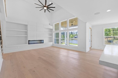 THIS GORGEOUS NEW CONSTRUCTION IS DIRECTLY ON OSPREY POINTE POND on Harbor Club Golf and Country Club in Georgia - for sale on GolfHomes.com, golf home, golf lot