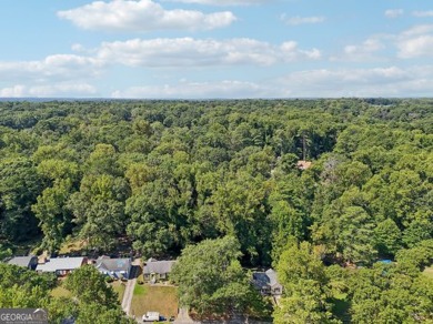 Discover the charm of 1626 Kenmore Street SW, a beautifully on John A. White Golf Course in Georgia - for sale on GolfHomes.com, golf home, golf lot