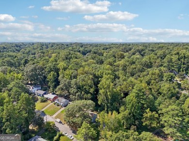 Discover the charm of 1626 Kenmore Street SW, a beautifully on John A. White Golf Course in Georgia - for sale on GolfHomes.com, golf home, golf lot