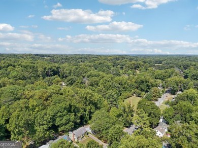 Discover the charm of 1626 Kenmore Street SW, a beautifully on John A. White Golf Course in Georgia - for sale on GolfHomes.com, golf home, golf lot