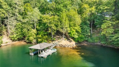 LONG RANGE WATER and BIG MOUNTAIN VIEWS framed by two spring-fed on The Reserve At Lake Keowee in South Carolina - for sale on GolfHomes.com, golf home, golf lot