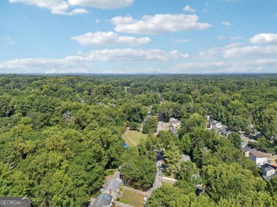 Discover the charm of 1626 Kenmore Street SW, a beautifully on John A. White Golf Course in Georgia - for sale on GolfHomes.com, golf home, golf lot