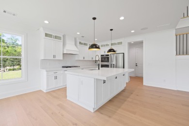 THIS GORGEOUS NEW CONSTRUCTION IS DIRECTLY ON OSPREY POINTE POND on Harbor Club Golf and Country Club in Georgia - for sale on GolfHomes.com, golf home, golf lot