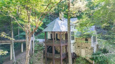 LONG RANGE WATER and BIG MOUNTAIN VIEWS framed by two spring-fed on The Reserve At Lake Keowee in South Carolina - for sale on GolfHomes.com, golf home, golf lot