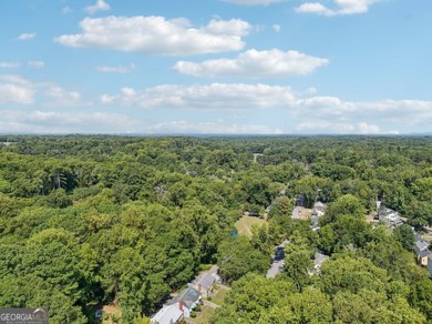 Discover the charm of 1626 Kenmore Street SW, a beautifully on John A. White Golf Course in Georgia - for sale on GolfHomes.com, golf home, golf lot