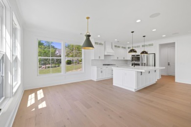THIS GORGEOUS NEW CONSTRUCTION IS DIRECTLY ON OSPREY POINTE POND on Harbor Club Golf and Country Club in Georgia - for sale on GolfHomes.com, golf home, golf lot