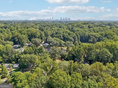 Discover the charm of 1626 Kenmore Street SW, a beautifully on John A. White Golf Course in Georgia - for sale on GolfHomes.com, golf home, golf lot