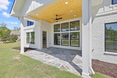 THIS GORGEOUS NEW CONSTRUCTION IS DIRECTLY ON OSPREY POINTE POND on Harbor Club Golf and Country Club in Georgia - for sale on GolfHomes.com, golf home, golf lot