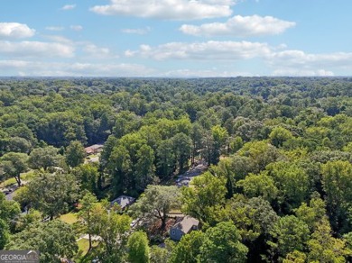 Discover the charm of 1626 Kenmore Street SW, a beautifully on John A. White Golf Course in Georgia - for sale on GolfHomes.com, golf home, golf lot