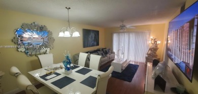 Welcome to your dream condo in Pembroke Pines! This stunning 2 on Flamingo Lakes Country Club in Florida - for sale on GolfHomes.com, golf home, golf lot