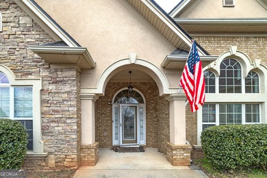This beautiful, custom built Ranch is located in the Lake Dow on Canongate At Georgia National Golf Club in Georgia - for sale on GolfHomes.com, golf home, golf lot