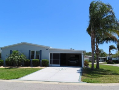 his great home is located on an oversized corner lot. The 18 x on Crane Lakes Golf and Country Club in Florida - for sale on GolfHomes.com, golf home, golf lot