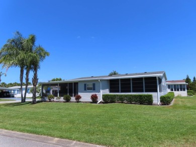 his great home is located on an oversized corner lot. The 18 x on Crane Lakes Golf and Country Club in Florida - for sale on GolfHomes.com, golf home, golf lot