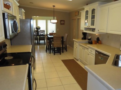 his great home is located on an oversized corner lot. The 18 x on Crane Lakes Golf and Country Club in Florida - for sale on GolfHomes.com, golf home, golf lot
