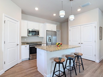 Experience the best of Florida living in this like-new 4BR/3.5BA on Venetian Bay Golf Course in Florida - for sale on GolfHomes.com, golf home, golf lot