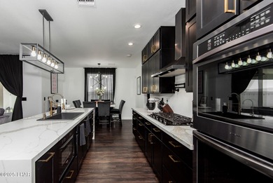 Presenting 6393 S Via De Oro, Fort Mohave, Arizona, a custom on Los Lagos Golf Club in Arizona - for sale on GolfHomes.com, golf home, golf lot