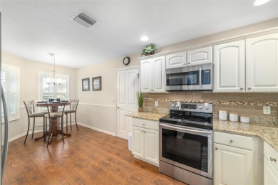 Welcome to this beautifully enhanced Wisteria model, where on Glenview Championship Golf and Country Club in Florida - for sale on GolfHomes.com, golf home, golf lot