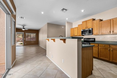 This spacious 2,013 sf home has 3 BR, 2 BA, kitchen, living rm on Estrella Mountain Ranch Golf Course in Arizona - for sale on GolfHomes.com, golf home, golf lot