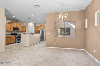 This spacious 2,013 sf home has 3 BR, 2 BA, kitchen, living rm on Estrella Mountain Ranch Golf Course in Arizona - for sale on GolfHomes.com, golf home, golf lot