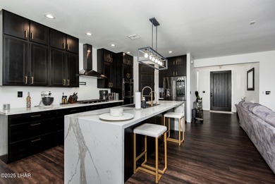 Presenting 6393 S Via De Oro, Fort Mohave, Arizona, a custom on Los Lagos Golf Club in Arizona - for sale on GolfHomes.com, golf home, golf lot