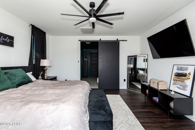 Presenting 6393 S Via De Oro, Fort Mohave, Arizona, a custom on Los Lagos Golf Club in Arizona - for sale on GolfHomes.com, golf home, golf lot