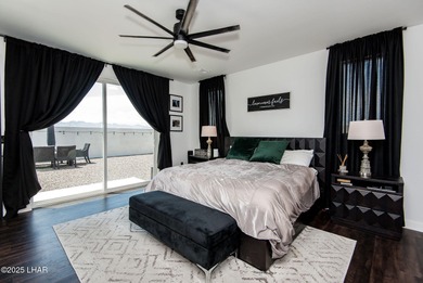 Presenting 6393 S Via De Oro, Fort Mohave, Arizona, a custom on Los Lagos Golf Club in Arizona - for sale on GolfHomes.com, golf home, golf lot