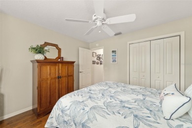 Welcome to this beautifully enhanced Wisteria model, where on Glenview Championship Golf and Country Club in Florida - for sale on GolfHomes.com, golf home, golf lot