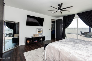 Presenting 6393 S Via De Oro, Fort Mohave, Arizona, a custom on Los Lagos Golf Club in Arizona - for sale on GolfHomes.com, golf home, golf lot