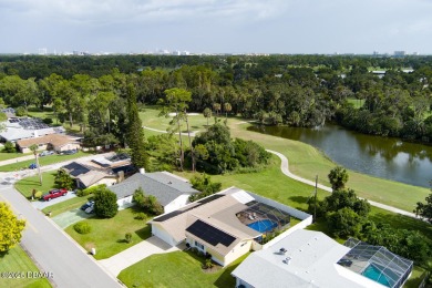 A GREAT home begins with GREAT curb appeal! This home is a on Daytona Beach Golf Club in Florida - for sale on GolfHomes.com, golf home, golf lot
