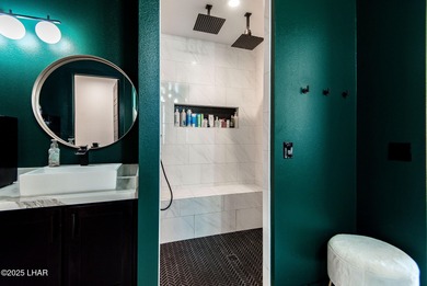 Presenting 6393 S Via De Oro, Fort Mohave, Arizona, a custom on Los Lagos Golf Club in Arizona - for sale on GolfHomes.com, golf home, golf lot