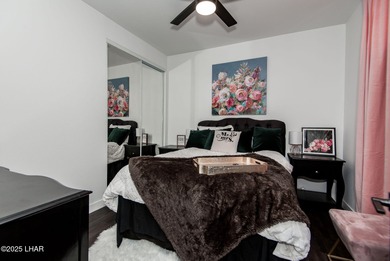 Presenting 6393 S Via De Oro, Fort Mohave, Arizona, a custom on Los Lagos Golf Club in Arizona - for sale on GolfHomes.com, golf home, golf lot