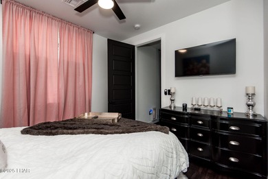 Presenting 6393 S Via De Oro, Fort Mohave, Arizona, a custom on Los Lagos Golf Club in Arizona - for sale on GolfHomes.com, golf home, golf lot