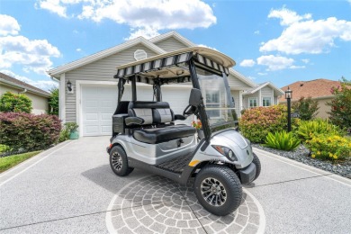 Welcome to this beautifully enhanced Wisteria model, where on Glenview Championship Golf and Country Club in Florida - for sale on GolfHomes.com, golf home, golf lot