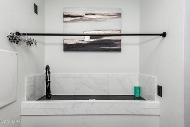 Presenting 6393 S Via De Oro, Fort Mohave, Arizona, a custom on Los Lagos Golf Club in Arizona - for sale on GolfHomes.com, golf home, golf lot