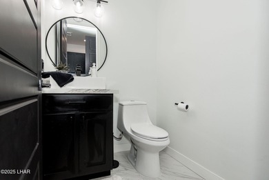 Presenting 6393 S Via De Oro, Fort Mohave, Arizona, a custom on Los Lagos Golf Club in Arizona - for sale on GolfHomes.com, golf home, golf lot